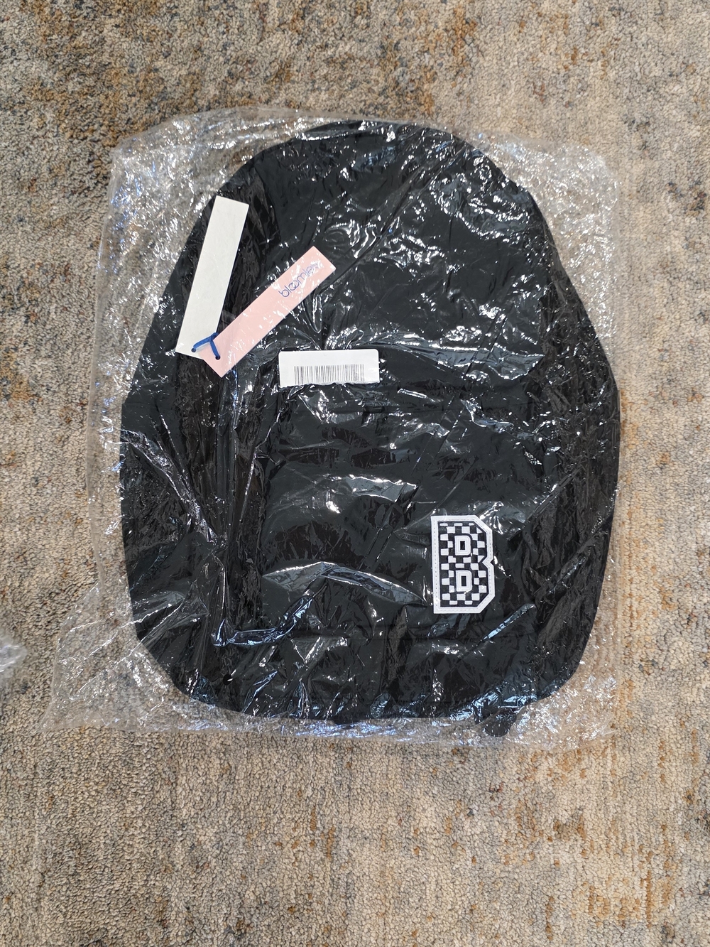 Bloomies Exclusive Black Backpack with Checkerboard "B" Patch - $65 MSRP